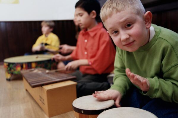 Child looking at camera in music